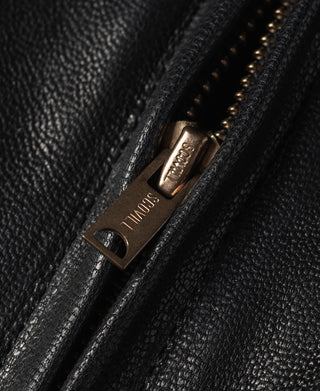 Black goatskin leather jacket zipper with metal pull and embossed tab