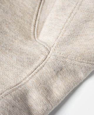 Oatmeal fleece sweatshirt arm panel with topstitched diagonal seam