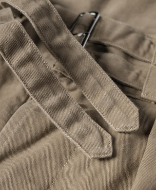 Khaki bermuda shorts waistband detail with wide belt loop and metal buckle