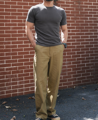 Dark gray ribbed knit T-shirt sleeve and shoulder seam detail