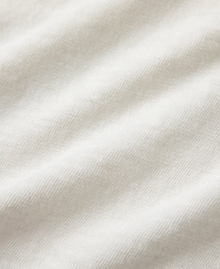 White cotton T-shirt fabric texture close-up