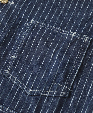 Indigo pinstripe work coat chest yoke and stitched pocket with brass-tone buttons