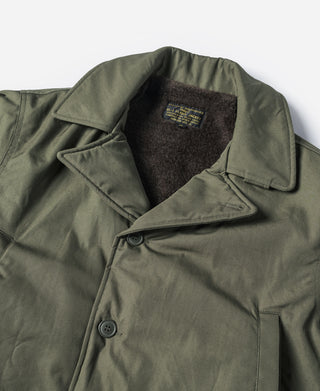 Olive AL-1 flight jacket chest detail with stand collar and snap-button placket
