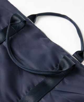 Navy helmet bag carry handle with webbed shoulder strap attachment