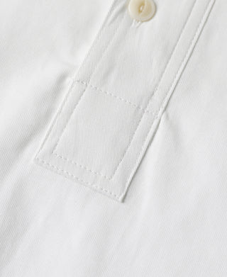 White henley t-shirt front placket with stitched detail and cream buttons