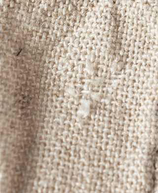 Linen tote bag fabric close-up in natural, textured weave