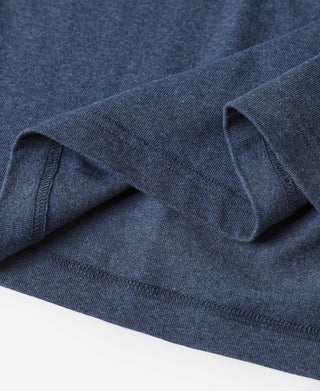 Denim blue cotton T-shirt sleeve and hem cuff with stitched seam