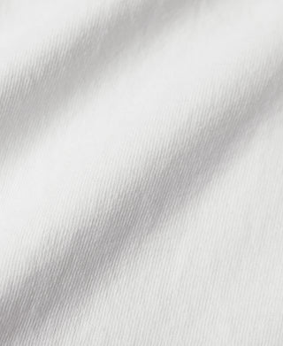 White cotton tubular T-shirt fabric texture close-up