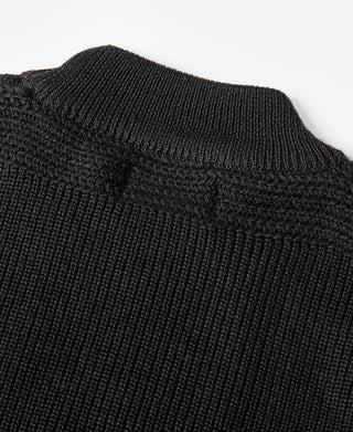 Black wool sweater with ribbed high collar and textured knit