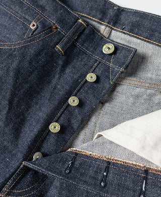 Dark blue denim jeans interior view with waistband buttons and belt loops.