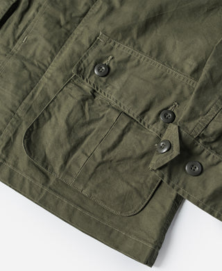 Olive fatigue jacket with front patch pockets and flap button closures