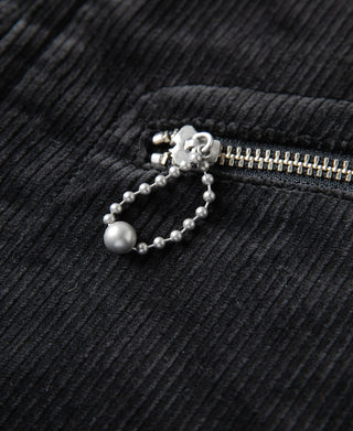 Pearl-style bead chain pull on black corduroy zip pocket