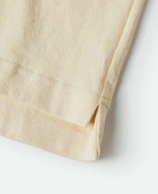 Apricot cotton t-shirt hem with stitched side seam