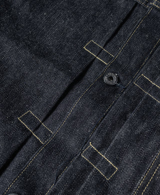 Indigo denim jacket front placket with small dark button and yellow stitching