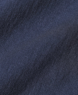 Navy sweatshirt fabric close-up with fine knit texture