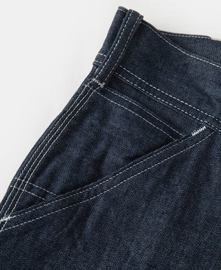 Indigo denim pocket panel with diagonal reinforcement stitching