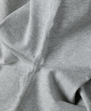 Gray cotton henley T-shirt underarm seam with soft jersey texture