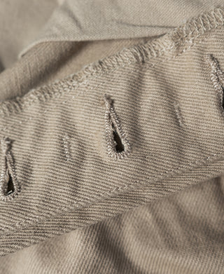 Khaki chino pants belt loop area with side bar tack stitching