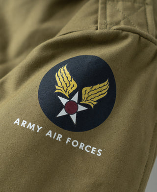 Khaki flight jacket sleeve patch reading “ARMY AIR FORCES” with blue emblem graphic.