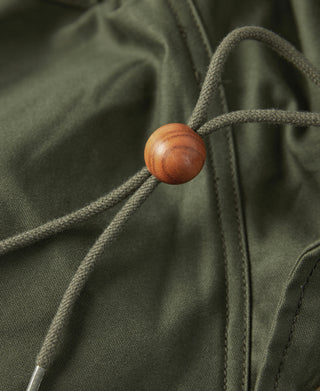 Olive cotton field parka drawstring with wood toggle and eyelet