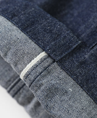 Indigo dungaree trousers waistband and belt loops, textured denim weave