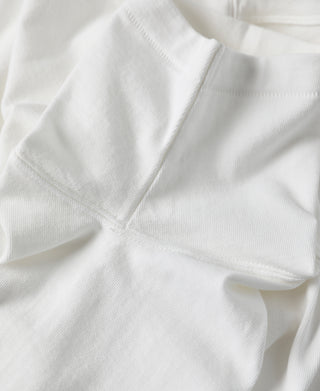 White t-shirt shoulder and sleeve seam closeup