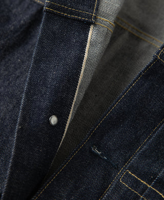 Indigo denim jacket chest pocket flap with snap and contrast stitching