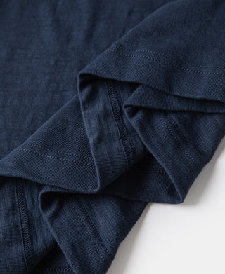 Indigo t-shirt sleeve hem and stitching detail