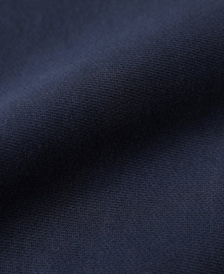 Navy sweatshirt fabric close-up with fine knit texture