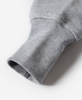Gray terry cloth hoodie sleeve cuff detail, ribbed knit hem