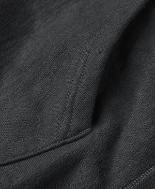 Black hoodie with stitched hem seam detail