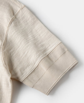 Loopwheel henley t-shirt sleeve cuff with ribbed hem in apricot-beige