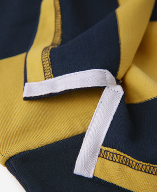 Ribbed trim and inner collar detail on a yellow and navy striped rugby shirt