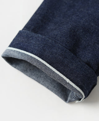Indigo denim jacket cuff with gray contrast stripe facing