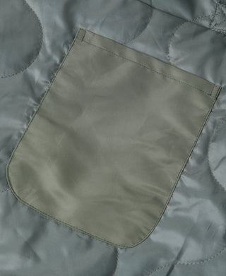 Olive tote bag front pocket panel with rounded edges and stitched border