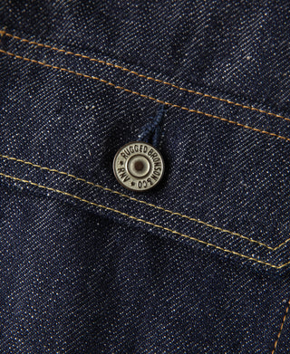 Indigo denim jacket pocket flap with round metal button
