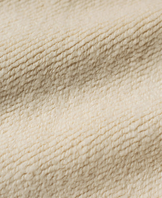 Apricot reverse-weave hoodie fabric knit texture close-up