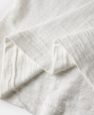 White henley t-shirt sleeve hem with clean stitched cuff