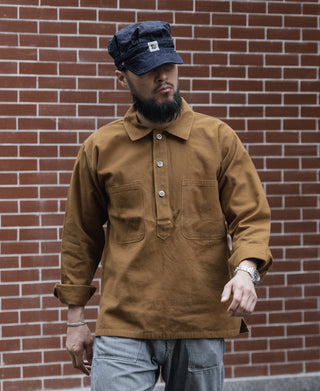 Indigo denim engineer cap with front label patch and layered crown