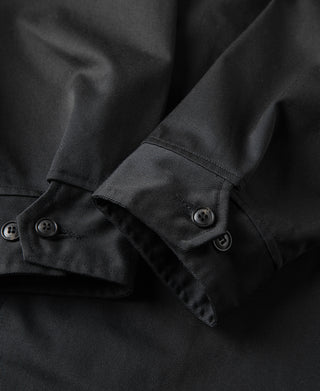 Black all-weather trench coat sleeve cuff with buttoned tab
