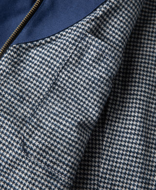 Houndstooth lining panels inside blue Cossack jacket