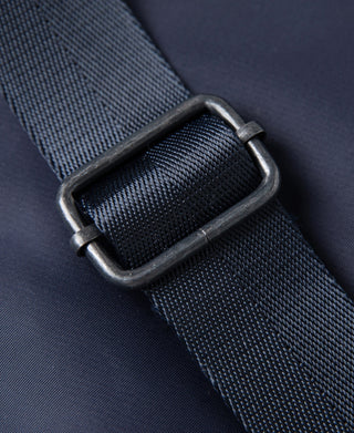 Navy webbing strap with metal buckle and reinforced loop