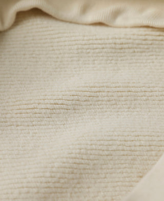 Apricot heavyweight fleece fabric texture with stitched detail lines
