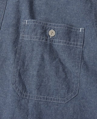 Blue chambray work shirt chest pocket with button placket