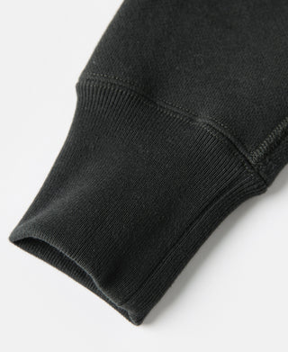 Vintage black sweater sleeve cuff with ribbed hem detail