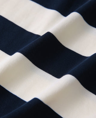 Heavyweight cotton fabric close-up with navy and white wide horizontal stripes