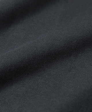 Vintage black knit fabric texture of Loopwheel tubular athletic T-shirt