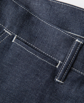 Indigo pants with stitched belt loop and bar-tack reinforcement
