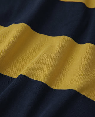 Close-up of yellow and navy horizontal stripes on jersey fabric