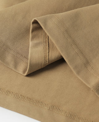 Khaki cotton henley T-shirt sleeve hem with visible seam stitching